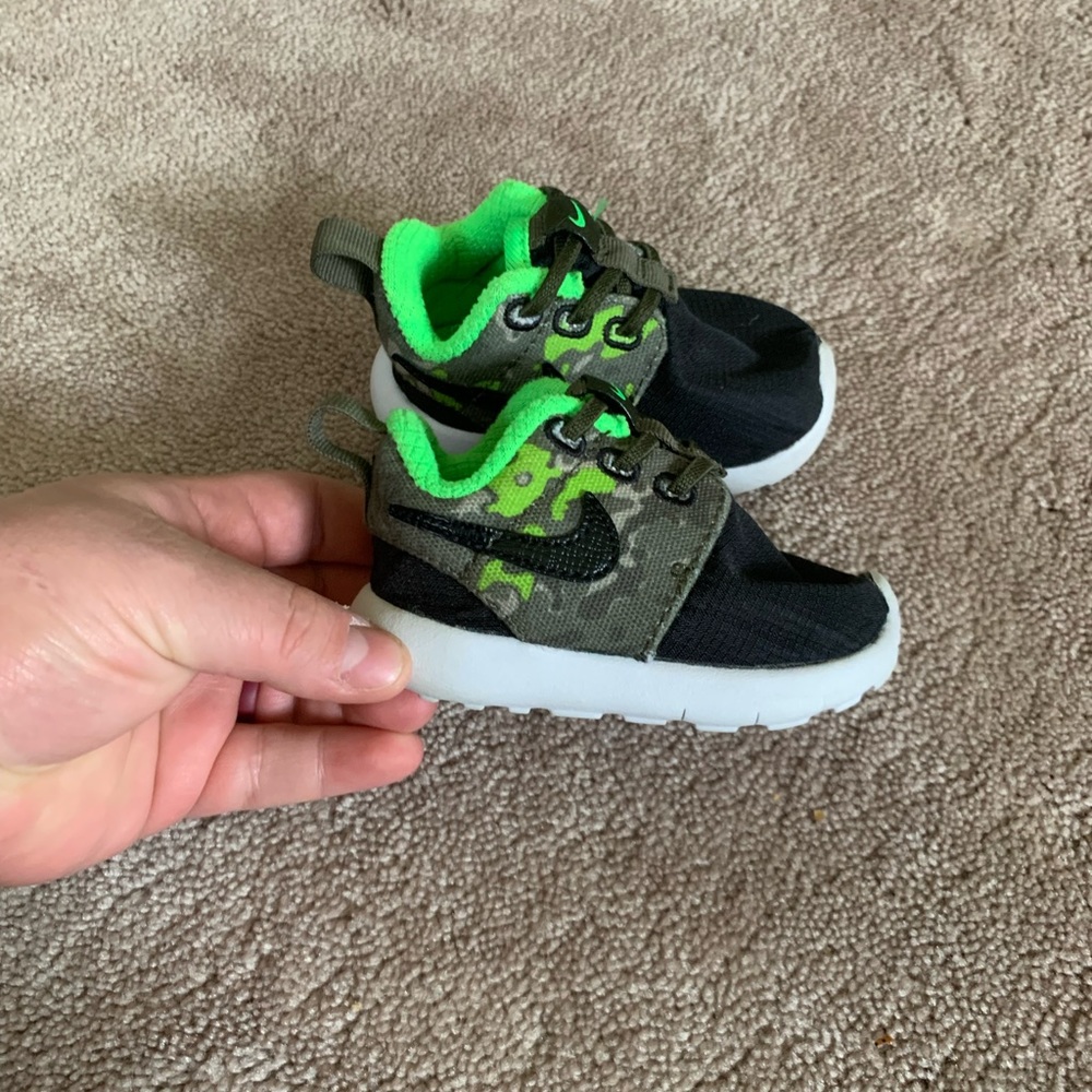 Green and black camo nike sneakers size 3